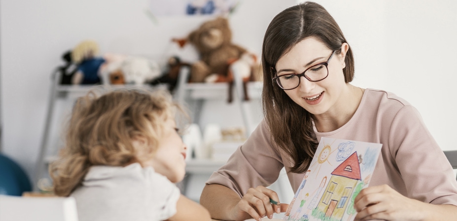 Young social work major working with child
